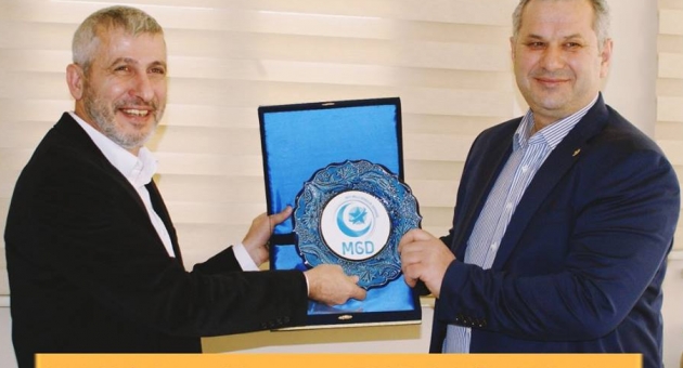 MGD DEN HASAN TURAN'a PLAKET