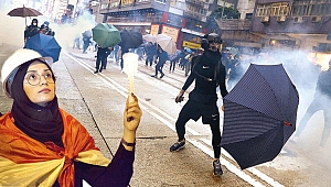 Hong Konglu genç eylemciler dün yine sokaktaydı.