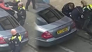 Çocuğunu yangından kurtarmak isteyen babaya polis şiddeti