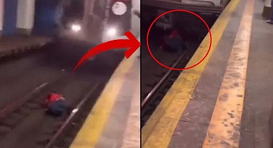 İntihar etmek için raylara atladı! Metronun makinisti santimler kala durdu... Dünyanın konuştuğu görüntü