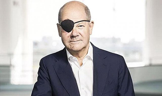 Scholz korsan bantlı fotoğrafını paylaştı