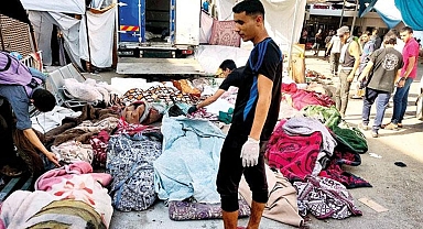Dünyanın gözlerinin önünde Şifa toplu mezarlığa dönüştü