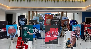 İSRAİLİN SAVAŞ SUÇU AFİŞLERE TAŞINDI